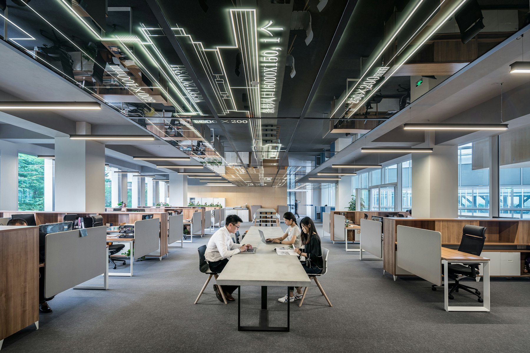 Open-plan office with staff working at desks